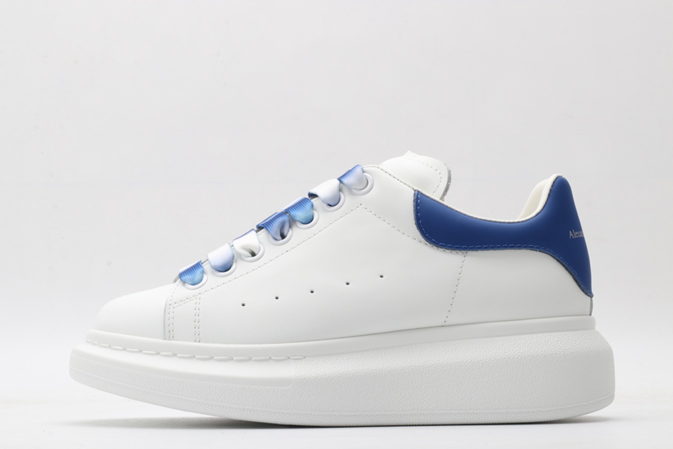 AMQ-oversized-sneakers-with-blue-heel.jpg