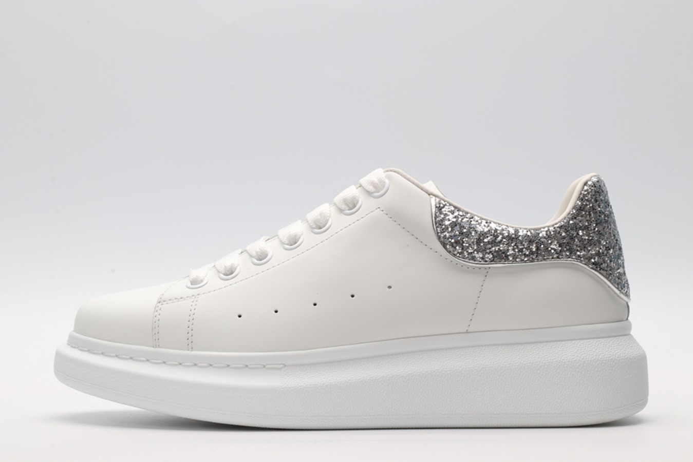 AMQ-oversized-sneakers-with-siLVer-heel.jpg